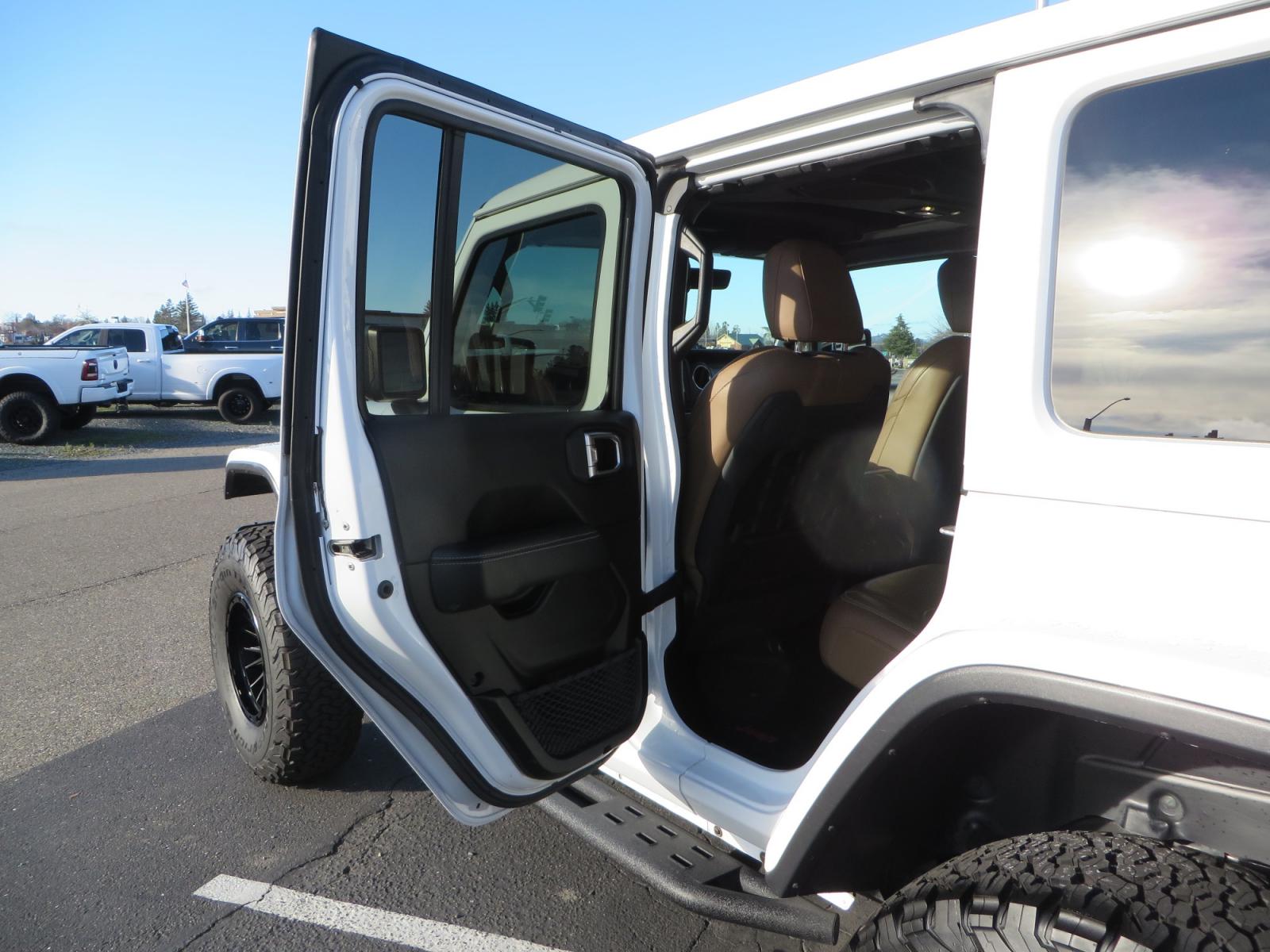 2020 White /TAN Jeep Wrangler Unlimited Rubicon (1C4HJXFG8LW) with an 3.6L V6 DOHC 24V FFV engine, 6A transmission, located at 2630 Grass Valley Highway, Auburn, CA, 95603, (530) 508-5100, 38.937893, -121.095482 - 3" Zone offroad suspension system, Fox adventure series shocks, rocksliders, Teraflex HD tire relocation, Mopar HD tailgate hinge, 17" KMC wheels, and 37" BFG KO2 tires. - Photo #37